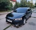 Чорний Міцубісі Lancer, об'ємом двигуна 2 л та пробігом 185 тис. км за 7800 $, фото 1 на Automoto.ua