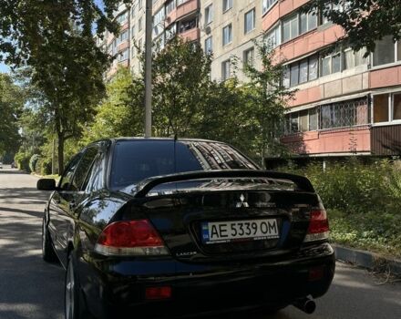 Черный Мицубиси Лансер, объемом двигателя 1.6 л и пробегом 184 тыс. км за 3700 $, фото 3 на Automoto.ua