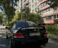Черный Мицубиси Лансер, объемом двигателя 1.6 л и пробегом 184 тыс. км за 3700 $, фото 3 на Automoto.ua
