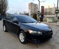 Черный Мицубиси Лансер, объемом двигателя 2 л и пробегом 240 тыс. км за 7200 $, фото 1 на Automoto.ua