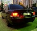 Чорний Міцубісі Lancer, об'ємом двигуна 1.6 л та пробігом 280 тис. км за 4700 $, фото 4 на Automoto.ua