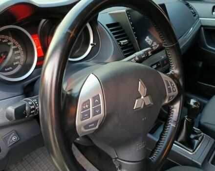 Мицубиси Лансер 2008 в Днепре (Днепропетровске) на Automoto.ua Черный Мицубиси Лансер, объемом двигателя 2 л и пробегом 196 тыс. км за 6900 $, фото 31 на Automoto.ua