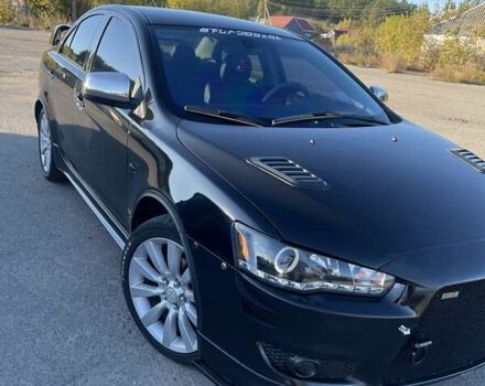 Чорний Міцубісі Lancer, об'ємом двигуна 2 л та пробігом 223 тис. км за 7800 $, фото 3 на Automoto.ua