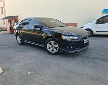 Чорний Міцубісі Lancer, об'ємом двигуна 2 л та пробігом 230 тис. км за 6650 $, фото 2 на Automoto.ua