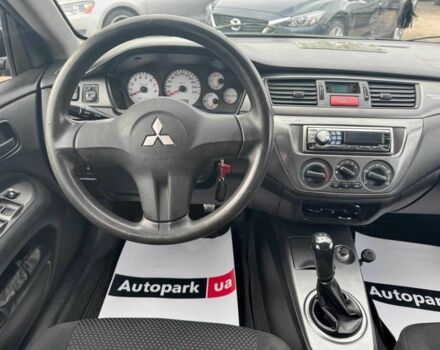 Мицубиси Лансер 2008 в Запорожье на Automoto.ua Черный Мицубиси Лансер, объемом двигателя 1.6 л и пробегом 316 тыс. км за 4290 $, фото 9 на Automoto.ua