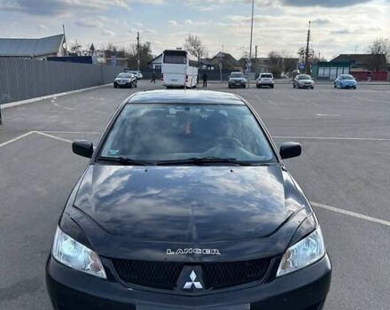 Чорний Міцубісі Lancer, об'ємом двигуна 1.6 л та пробігом 310 тис. км за 3500 $, фото 26 на Automoto.ua
