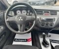 Мицубиси Лансер 2008 в Запорожье на Automoto.ua Черный Мицубиси Лансер, объемом двигателя 1.6 л и пробегом 316 тыс. км за 4290 $, фото 9 на Automoto.ua