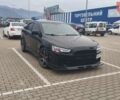 Чорний Міцубісі Lancer, об'ємом двигуна 2 л та пробігом 160 тис. км за 7000 $, фото 1 на Automoto.ua