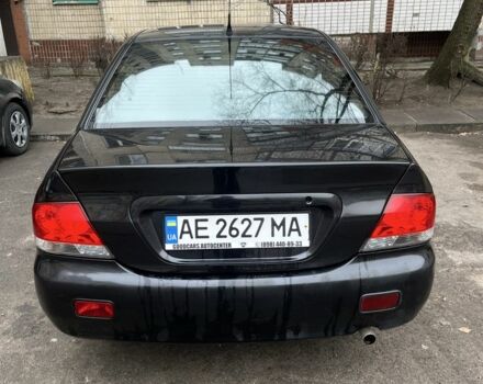 Чорний Міцубісі Lancer, об'ємом двигуна 1.6 л та пробігом 250 тис. км за 3900 $, фото 5 на Automoto.ua