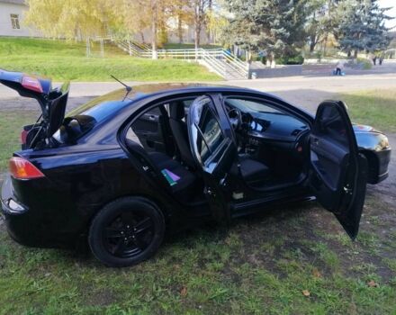 Міцубісі Lancer 2008 у Києві на Automoto.ua Чорний Міцубісі Lancer, об'ємом двигуна 2 л та пробігом 196 тис. км за 5500 $, фото 20 на Automoto.ua