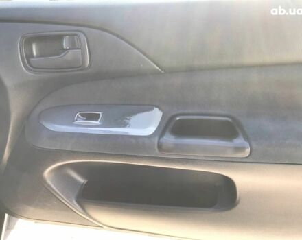 Черный Мицубиси Лансер, объемом двигателя 1.6 л и пробегом 356 тыс. км за 4590 $, фото 5 на Automoto.ua