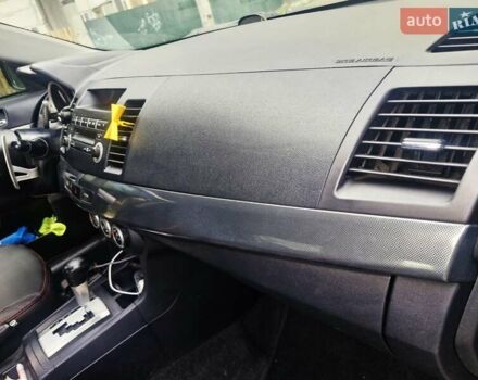 Чорний Міцубісі Lancer, об'ємом двигуна 2 л та пробігом 240 тис. км за 7850 $, фото 23 на Automoto.ua