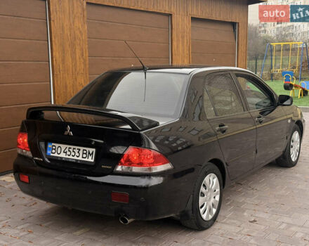 Чорний Міцубісі Lancer, об'ємом двигуна 1.6 л та пробігом 265 тис. км за 4700 $, фото 7 на Automoto.ua