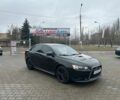 Черный Мицубиси Лансер, объемом двигателя 2 л и пробегом 213 тыс. км за 7400 $, фото 1 на Automoto.ua