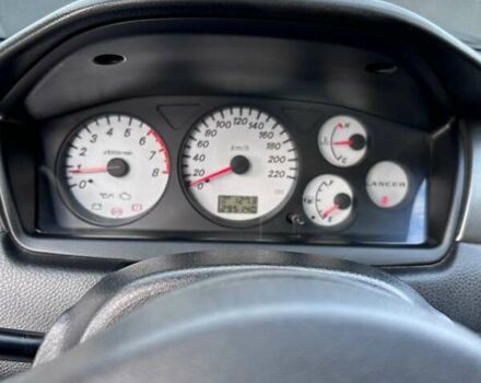 Чорний Міцубісі Lancer, об'ємом двигуна 1.6 л та пробігом 310 тис. км за 3500 $, фото 22 на Automoto.ua