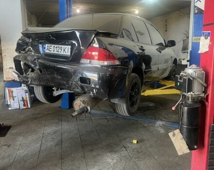 Чорний Міцубісі Lancer, об'ємом двигуна 1.6 л та пробігом 188 тис. км за 2200 $, фото 6 на Automoto.ua
