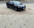 Черный Мицубиси Лансер, объемом двигателя 2 л и пробегом 240 тыс. км за 5900 $, фото 1 на Automoto.ua