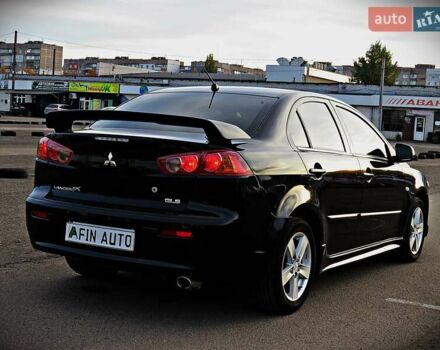 Мицубиси Лансер 2008 в Черкассах на Automoto.ua Черный Мицубиси Лансер, объемом двигателя 2 л и пробегом 178 тыс. км за 7400 $, фото 2 на Automoto.ua