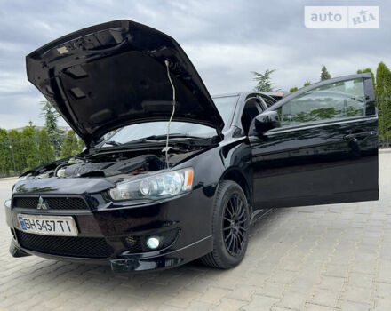 Чорний Міцубісі Lancer, об'ємом двигуна 2 л та пробігом 137 тис. км за 8750 $, фото 69 на Automoto.ua