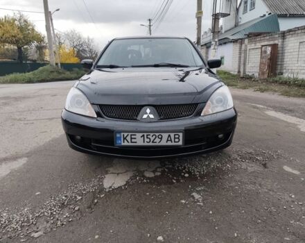Черный Мицубиси Лансер, объемом двигателя 1.6 л и пробегом 270 тыс. км за 3800 $, фото 1 на Automoto.ua