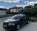 Чорний Міцубісі Lancer, об'ємом двигуна 2 л та пробігом 163 тис. км за 8000 $, фото 1 на Automoto.ua