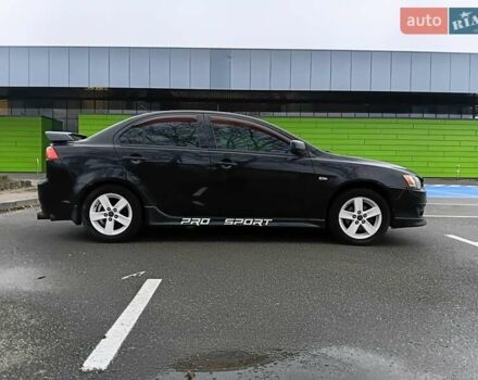 Чорний Міцубісі Lancer, об'ємом двигуна 2 л та пробігом 275 тис. км за 5200 $, фото 7 на Automoto.ua