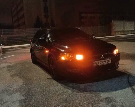 Черный Мицубиси Лансер, объемом двигателя 2 л и пробегом 240 тыс. км за 6400 $, фото 20 на Automoto.ua