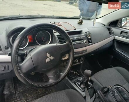 Черный Мицубиси Лансер, объемом двигателя 1.5 л и пробегом 253 тыс. км за 5500 $, фото 8 на Automoto.ua