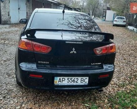Черный Мицубиси Лансер, объемом двигателя 2 л и пробегом 63 тыс. км за 8000 $, фото 2 на Automoto.ua