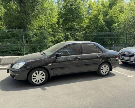 Чорний Міцубісі Lancer, об'ємом двигуна 1.6 л та пробігом 78 тис. км за 3999 $, фото 1 на Automoto.ua