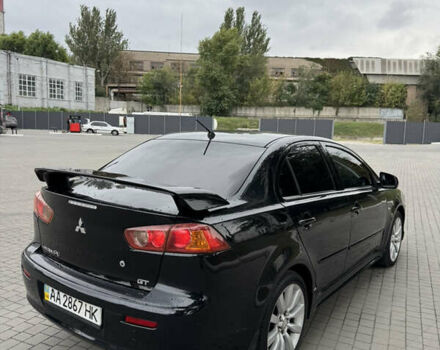 Чорний Міцубісі Lancer, об'ємом двигуна 2 л та пробігом 200 тис. км за 6800 $, фото 2 на Automoto.ua