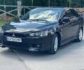 Чорний Міцубісі Lancer, об'ємом двигуна 2 л та пробігом 245 тис. км за 5990 $, фото 1 на Automoto.ua