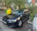 Чорний Міцубісі Lancer, об'ємом двигуна 2 л та пробігом 301 тис. км за 7300 $, фото 1 на Automoto.ua