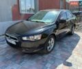 Черный Мицубиси Лансер, объемом двигателя 1.5 л и пробегом 350 тыс. км за 3500 $, фото 1 на Automoto.ua