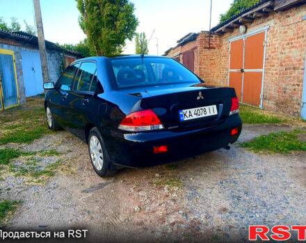 Чорний Міцубісі Lancer, об'ємом двигуна 1.6 л та пробігом 219 тис. км за 4800 $, фото 3 на Automoto.ua