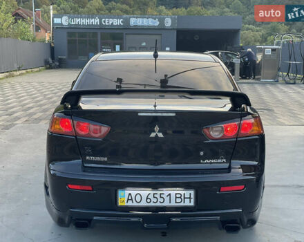 Чорний Міцубісі Lancer, об'ємом двигуна 2 л та пробігом 300 тис. км за 4600 $, фото 11 на Automoto.ua