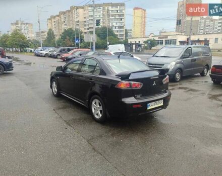Черный Мицубиси Лансер, объемом двигателя 2 л и пробегом 228 тыс. км за 7300 $, фото 4 на Automoto.ua