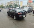 Черный Мицубиси Лансер, объемом двигателя 2 л и пробегом 228 тыс. км за 7300 $, фото 4 на Automoto.ua