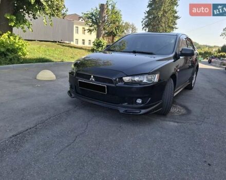 Черный Мицубиси Лансер, объемом двигателя 2 л и пробегом 230 тыс. км за 7000 $, фото 15 на Automoto.ua