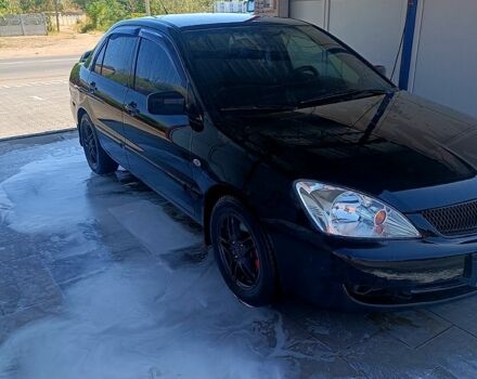 Чорний Міцубісі Lancer, об'ємом двигуна 1.6 л та пробігом 0 тис. км за 4200 $, фото 4 на Automoto.ua