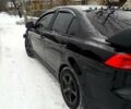 Чорний Міцубісі Lancer, об'ємом двигуна 2 л та пробігом 208 тис. км за 9500 $, фото 5 на Automoto.ua