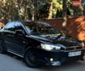 Черный Мицубиси Лансер, объемом двигателя 2 л и пробегом 229 тыс. км за 6750 $, фото 1 на Automoto.ua