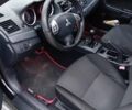 Чорний Міцубісі Lancer, об'ємом двигуна 2 л та пробігом 275 тис. км за 5200 $, фото 9 на Automoto.ua
