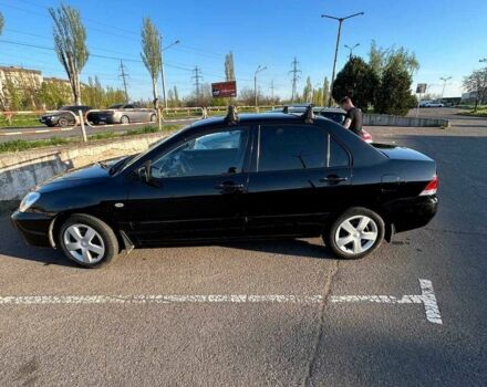 Чорний Міцубісі Lancer, об'ємом двигуна 0.16 л та пробігом 271 тис. км за 5500 $, фото 8 на Automoto.ua