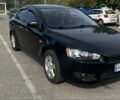 Чорний Міцубісі Lancer, об'ємом двигуна 2 л та пробігом 221 тис. км за 6300 $, фото 1 на Automoto.ua