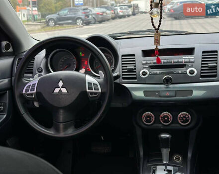 Черный Мицубиси Лансер, объемом двигателя 2 л и пробегом 236 тыс. км за 7950 $, фото 10 на Automoto.ua