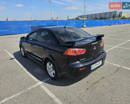 Чорний Міцубісі Lancer, об'ємом двигуна 2 л та пробігом 249 тис. км за 6500 $, фото 7 на Automoto.ua