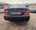 Мицубиси Лансер 2008 в Запорожье на Automoto.ua Черный Мицубиси Лансер, объемом двигателя 1.6 л и пробегом 316 тыс. км за 4290 $, фото 5 на Automoto.ua