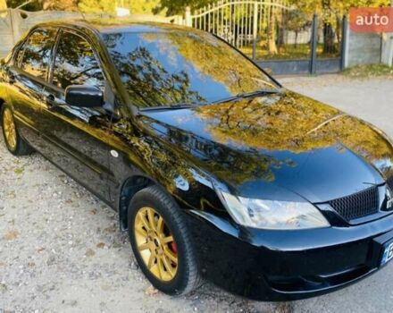 Мицубиси Лансер 2008 в Львове на Automoto.ua Черный Мицубиси Лансер, объемом двигателя 1.58 л и пробегом 200 тыс. км за 5200 $, фото 20 на Automoto.ua