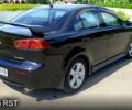 Чорний Міцубісі Lancer, об'ємом двигуна 2 л та пробігом 251 тис. км за 7500 $, фото 3 на Automoto.ua